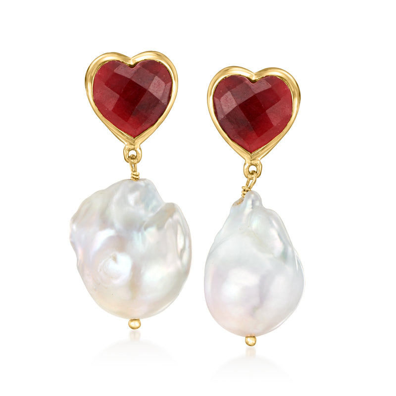 Gold-tone heart drop earrings with red ruby-style heart tops and large white baroque pearls