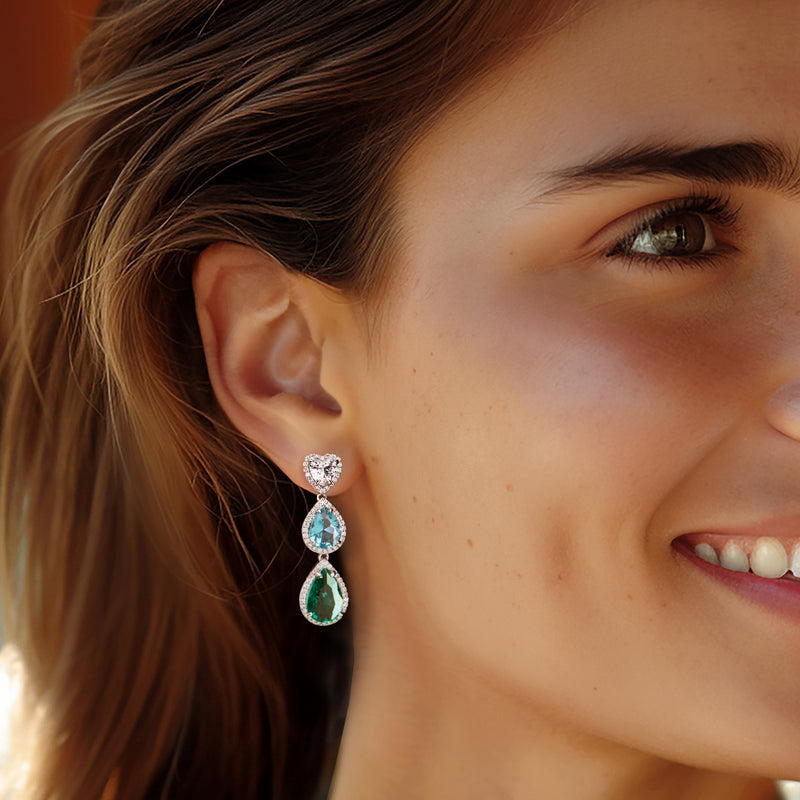 Sterling silver drop earrings with heart-cut CZ, blue top and green bottom teardrops
