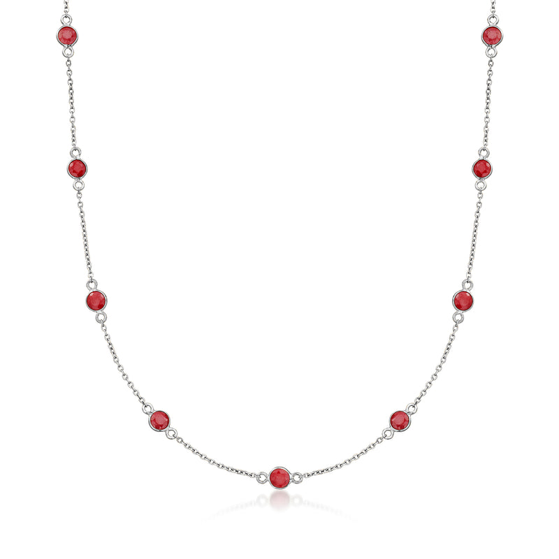 Sterling silver ruby station necklace with oval red gemstones in linked rows