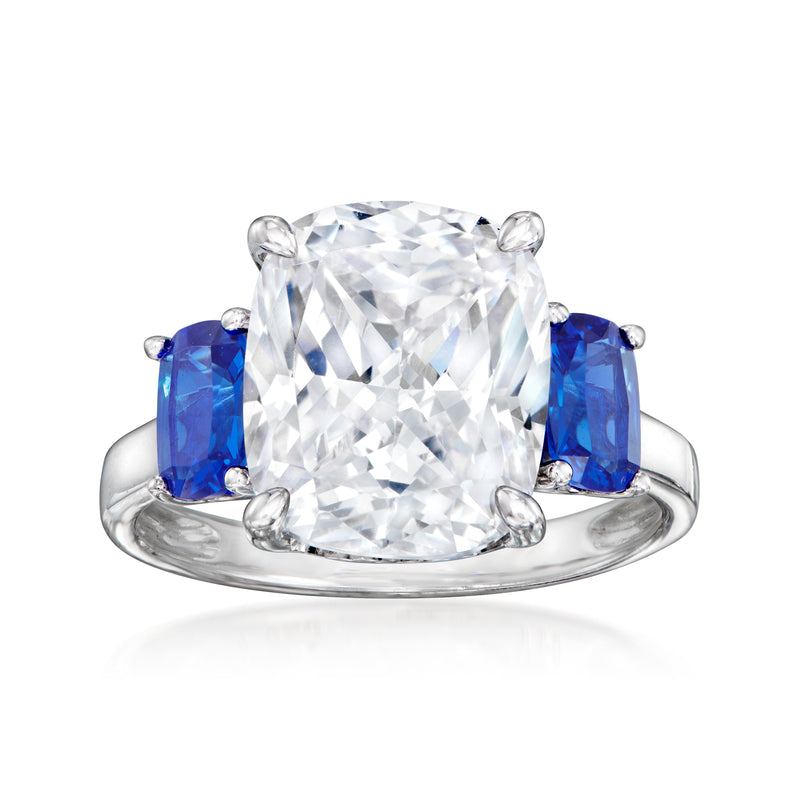 Sterling silver ring with large clear CZ centerpiece and two blue simulated sapphire stones