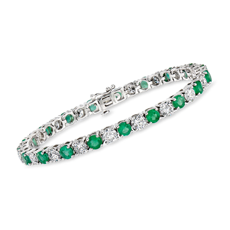 14kt white gold tennis bracelet with green emerald-cut stones and diamond accents