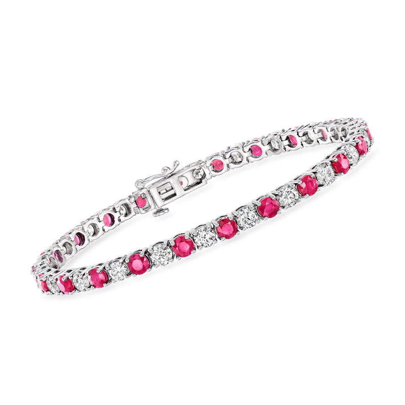 14kt white gold tennis bracelet with round pink ruby stones and diamond accents, hinged clasp