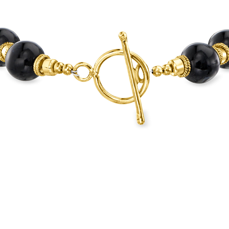 Onyx bead bracelet with gold-tone toggle clasp and textured bead spacers