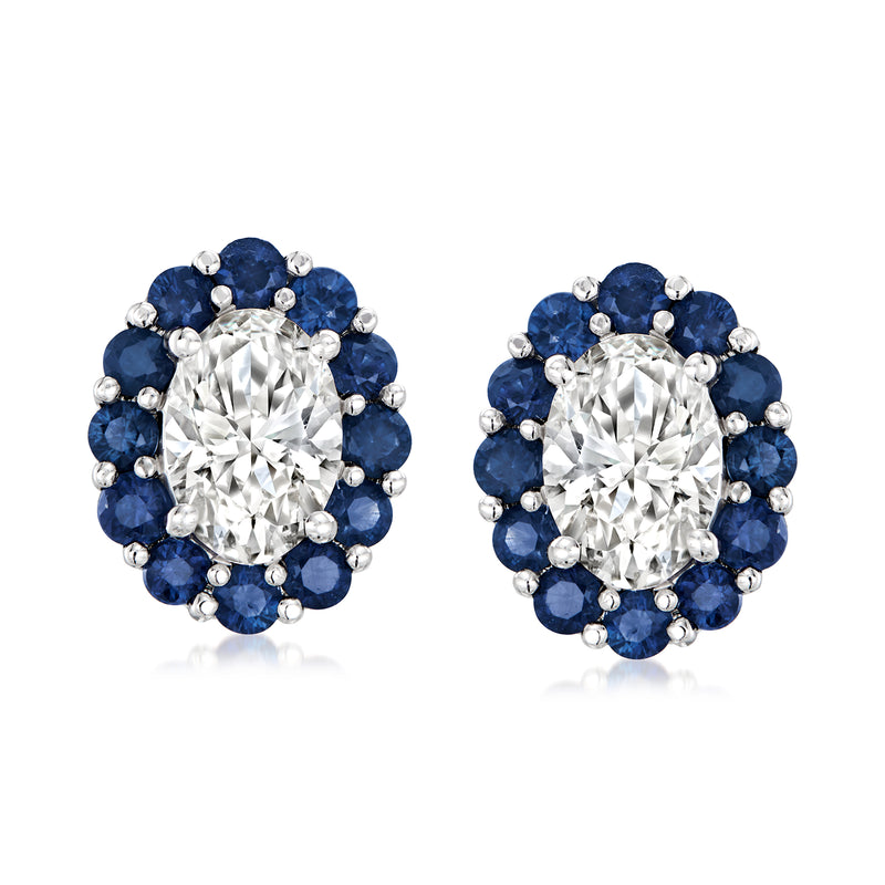 Round diamond stud earrings with sapphire halo, 14kt white gold, post back.
