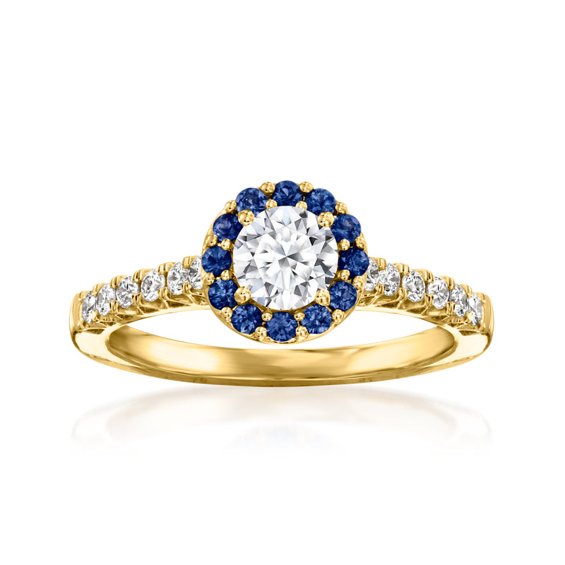 14kt yellow gold ring with round lab diamond center and blue sapphire halo