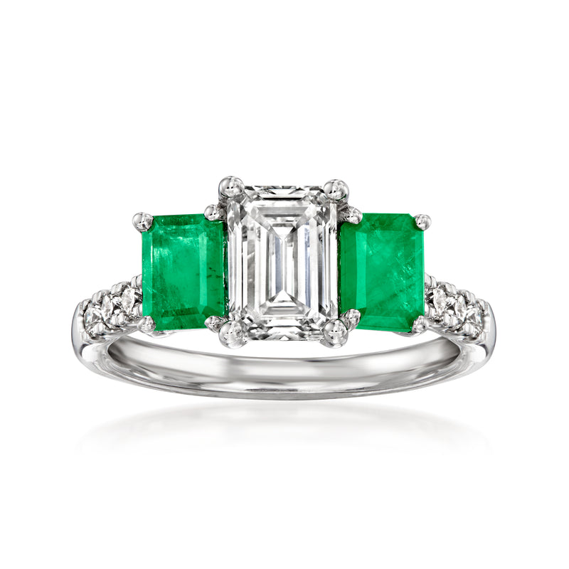14kt white gold ring with emerald rectangular side stones and center emerald-cut diamond