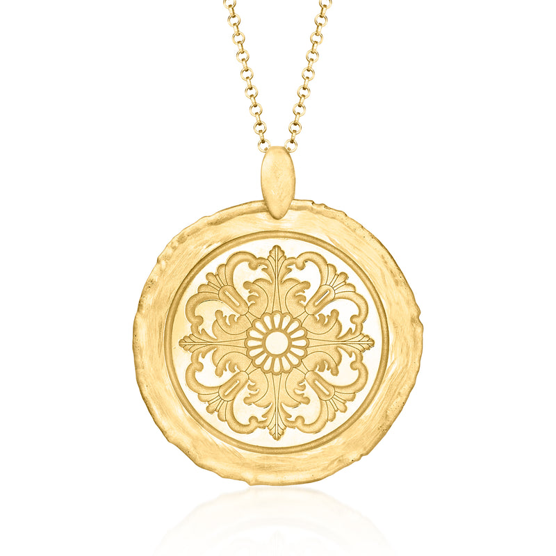 Gold-tone rosette pendant necklace with etched round disc and small bail on chain