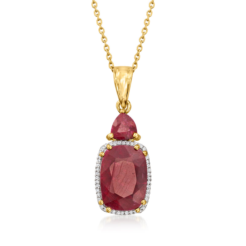 Gold pendant necklace with oval red ruby, diamond halo, and teardrop bail