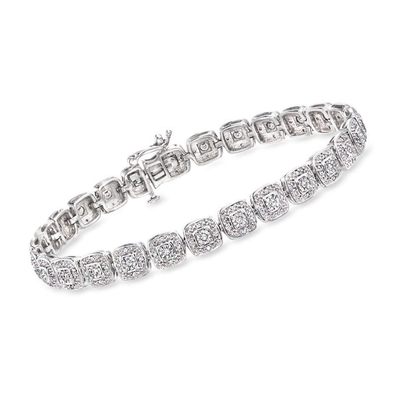Sterling silver bracelet with cushion-cut diamond stations and pave-set detail