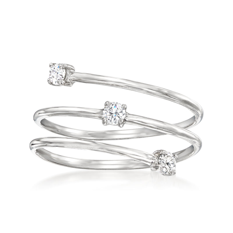 Sterling silver diamond coil ring with three round-cut stones in a twisted band