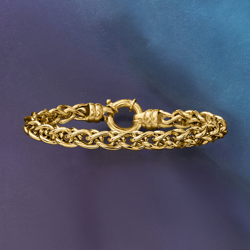 Gold over sterling wheat-chain bracelet shown from side, with round ring clasp