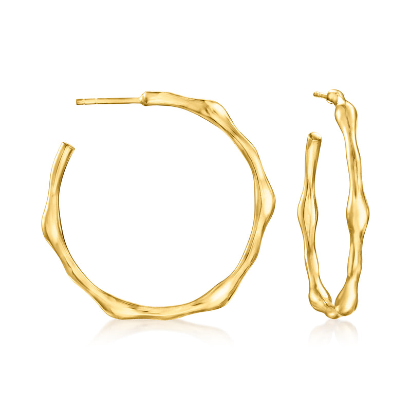 Gold over sterling bamboo-style hoop earrings with twisted wavy texture, open oval hoops