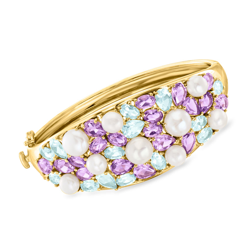 Gold bangle bracelet with oval and round cultured pearls and purple/blue gemstones