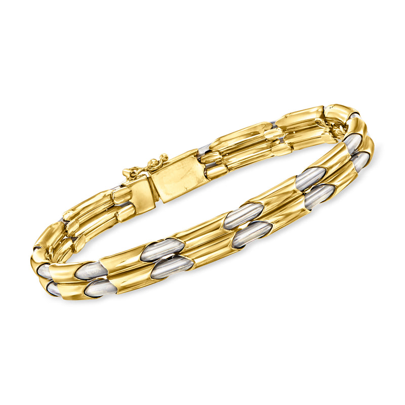 Two-tone gold bracelet with baguette links and oval bezel detailing