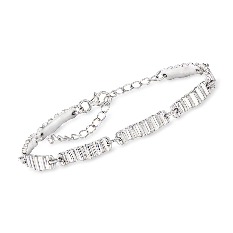 Sterling silver ridged-link bracelet with hinged clasp and safety chain