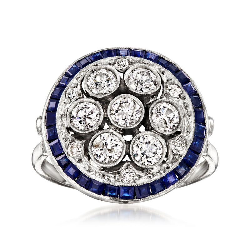 Platinum ring with blue sapphire halo and round diamond cluster top view