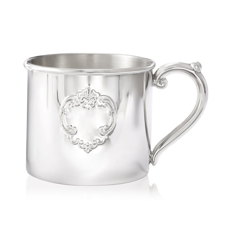 Sterling silver baby cup with embossed crest medallion and loop handle