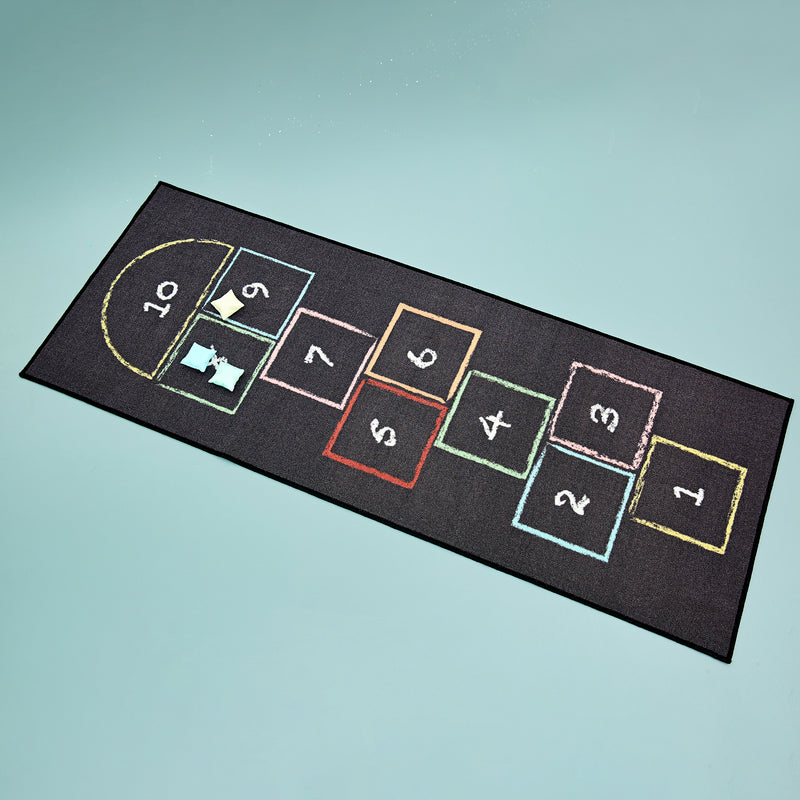 Children's hopscotch play rug with numbered grid squares in assorted colors