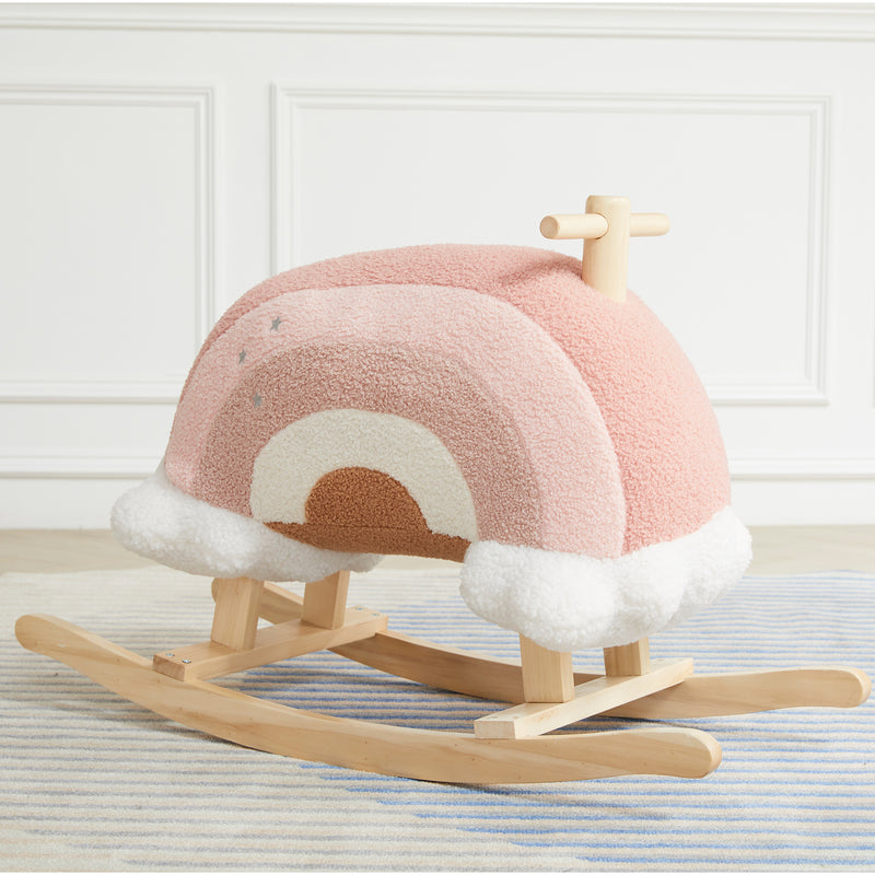 Plush rainbow rocking toy with wooden rocker base and padded rainbow canopy