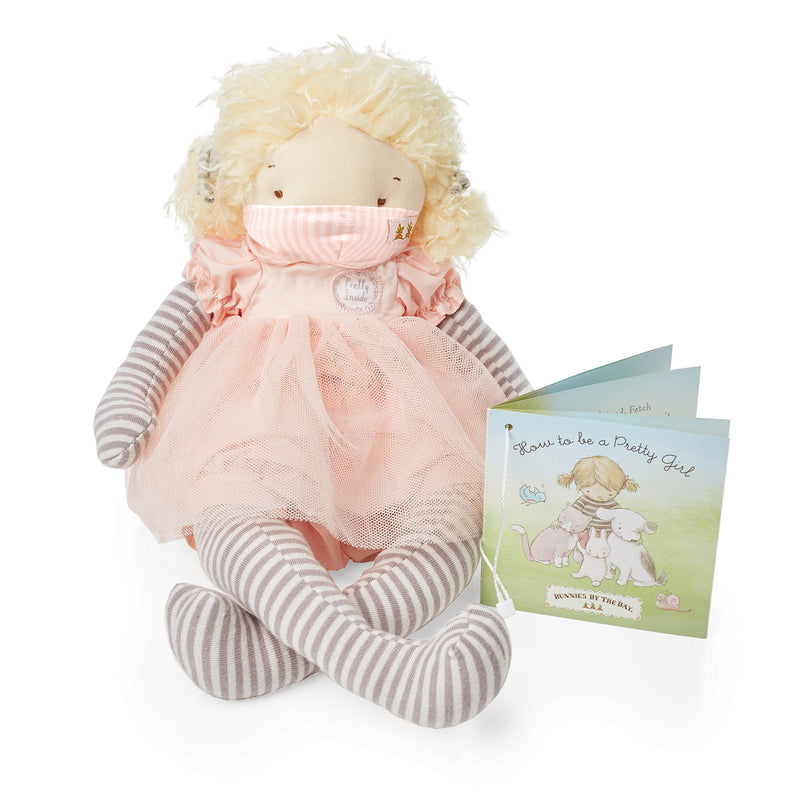 Plush girl doll with striped tights and pink dress, plus illustrated gift card