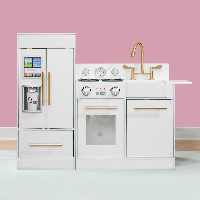 Kids modern play kitchen set in white with gold knobs, stovetop, and sink