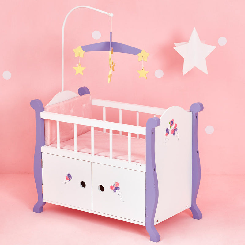 Child's light blue and white doll bed with cabinet drawers, canopy arch and star mobile