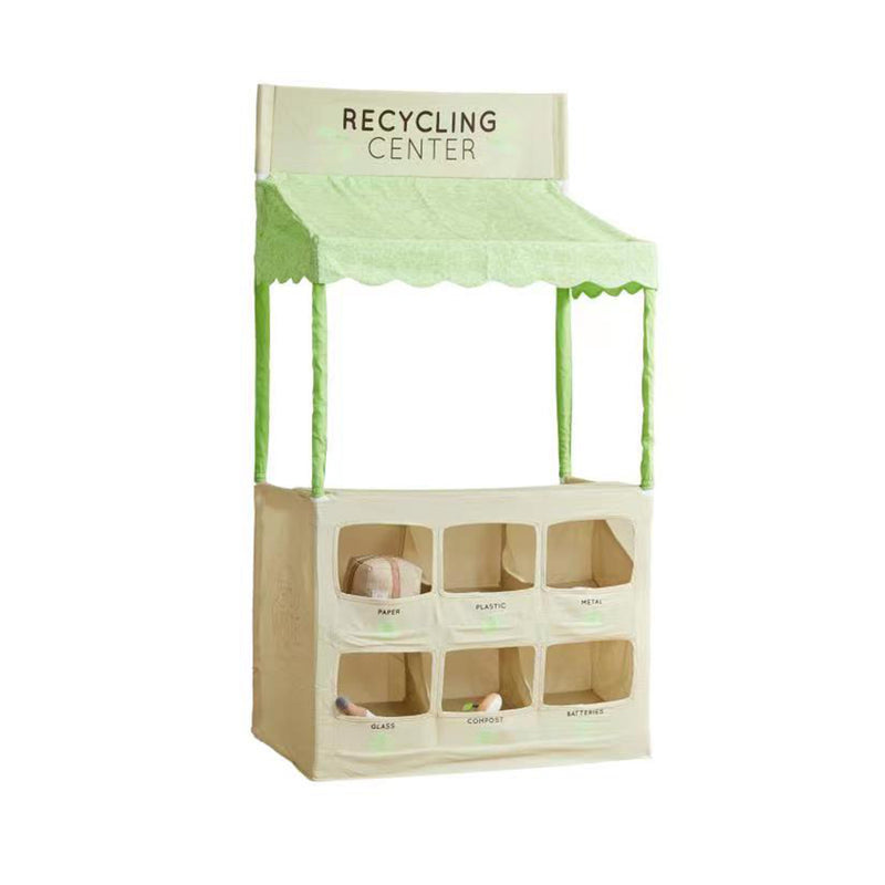 Children's recycling play stand with green canopy and labeled “Recycling Center”
