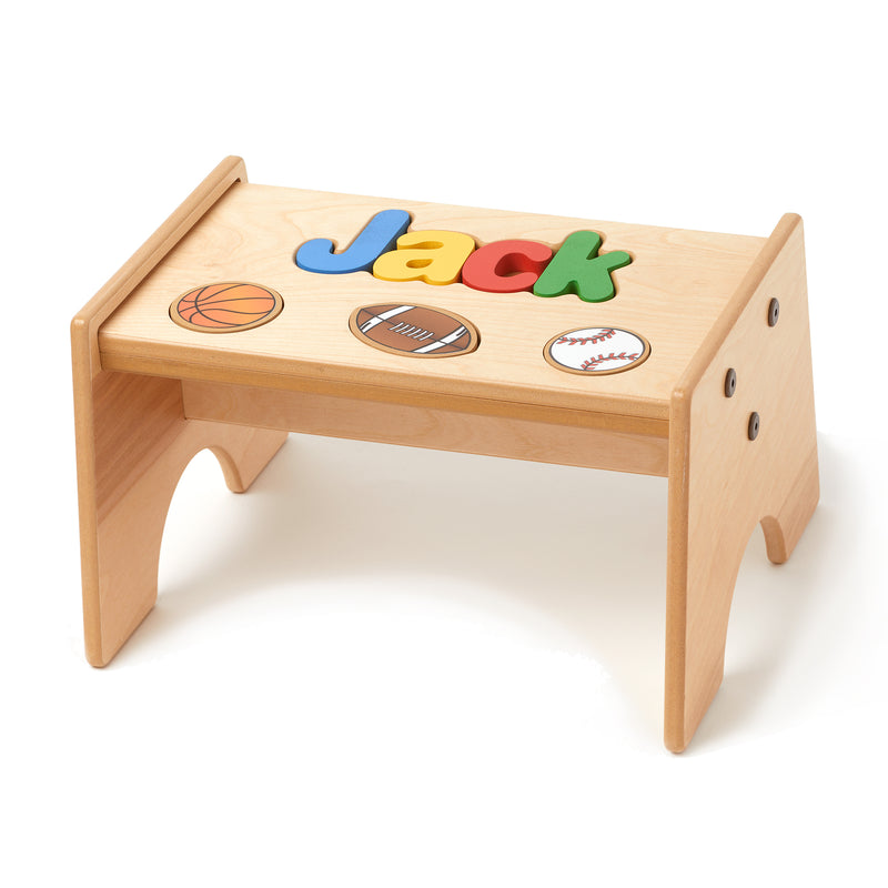 Maple puzzle stool with removable sports pieces in primary colors