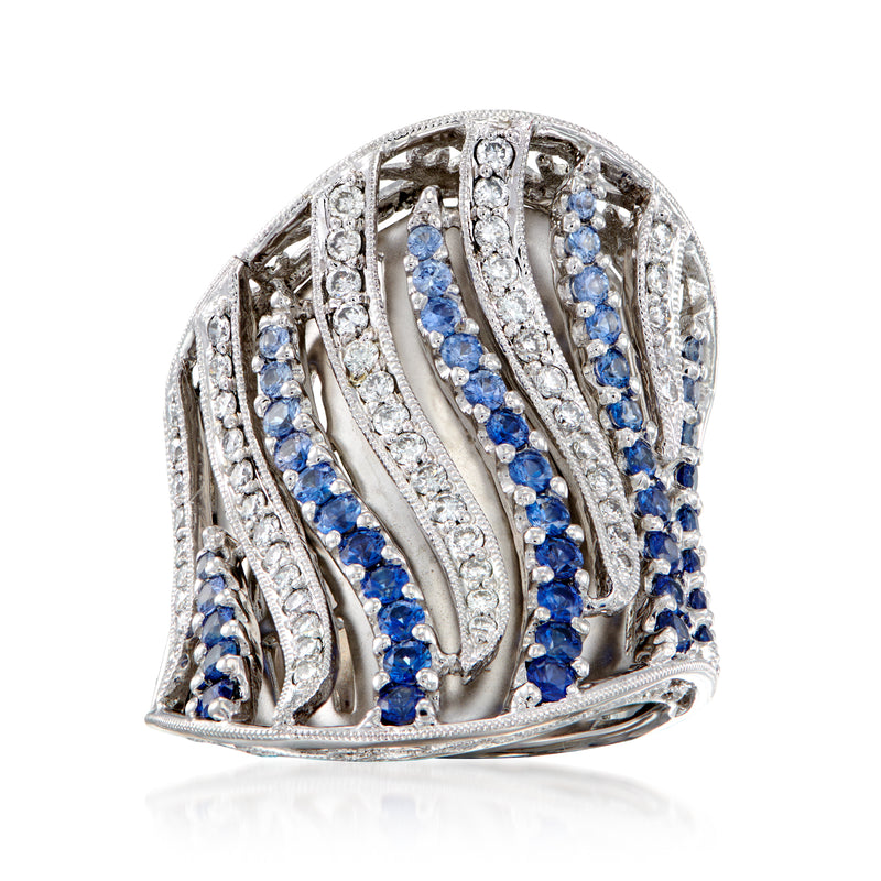 18kt white gold cocktail ring with blue sapphires and white diamond accents, striped design