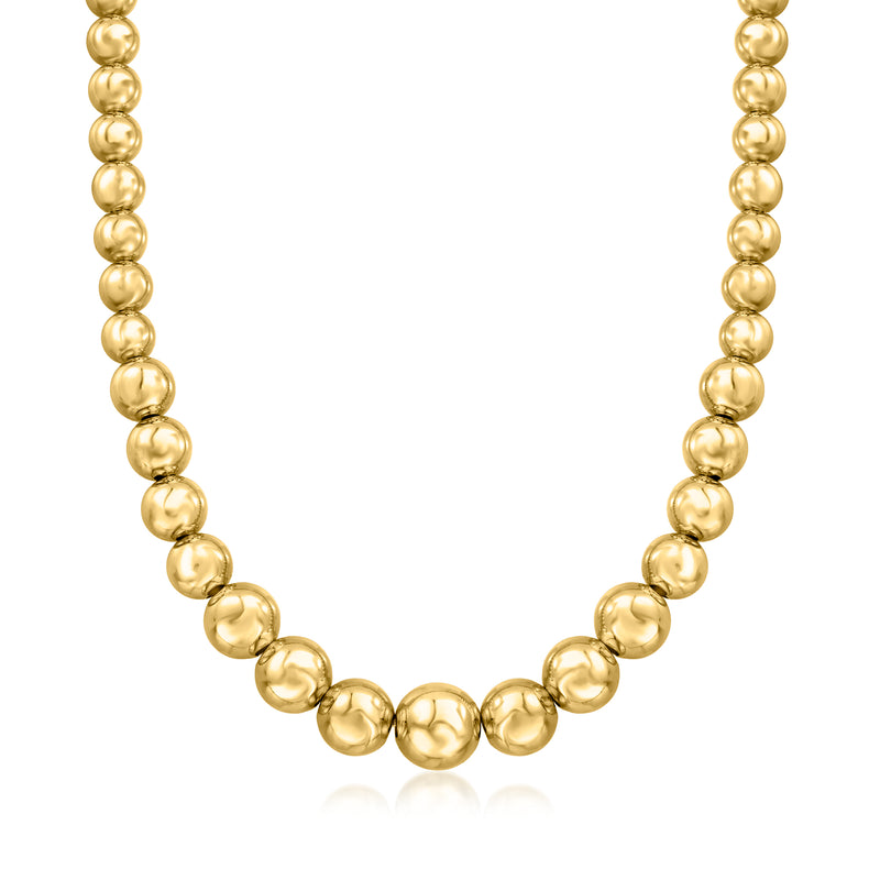 Graduated bead necklace with gold-tone round beads and link-style chain