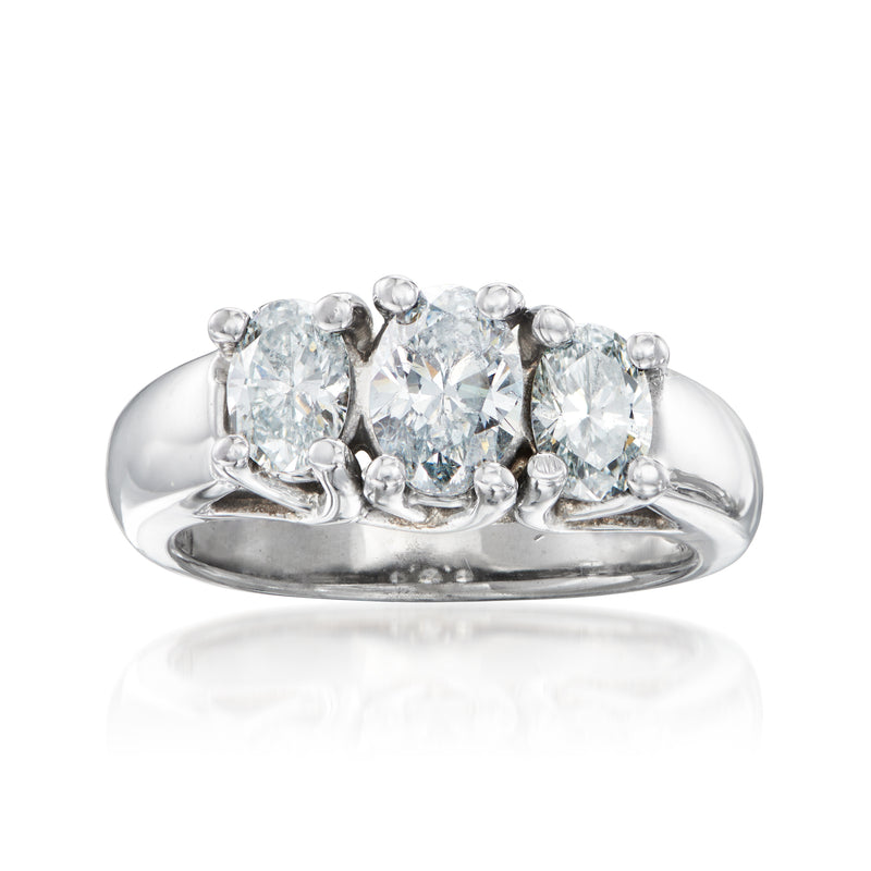 Platinum three-stone diamond ring with three round-cut stones