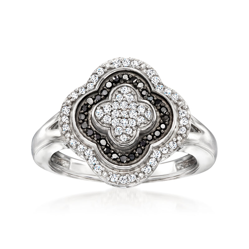 Sterling silver clover diamond ring with black-and-white stones in halo bezel setting