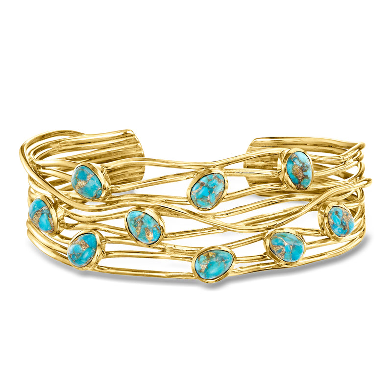 Gold cuff bracelet with turquoise oval stones and crisscross wire design
