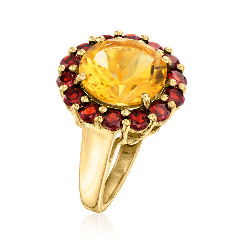 Gold ring featuring yellow citrine centerpiece with red garnet border
