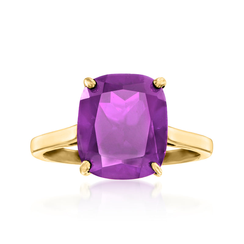 Gold-tone amethyst ring with large cushion-cut purple gemstone and four prongs