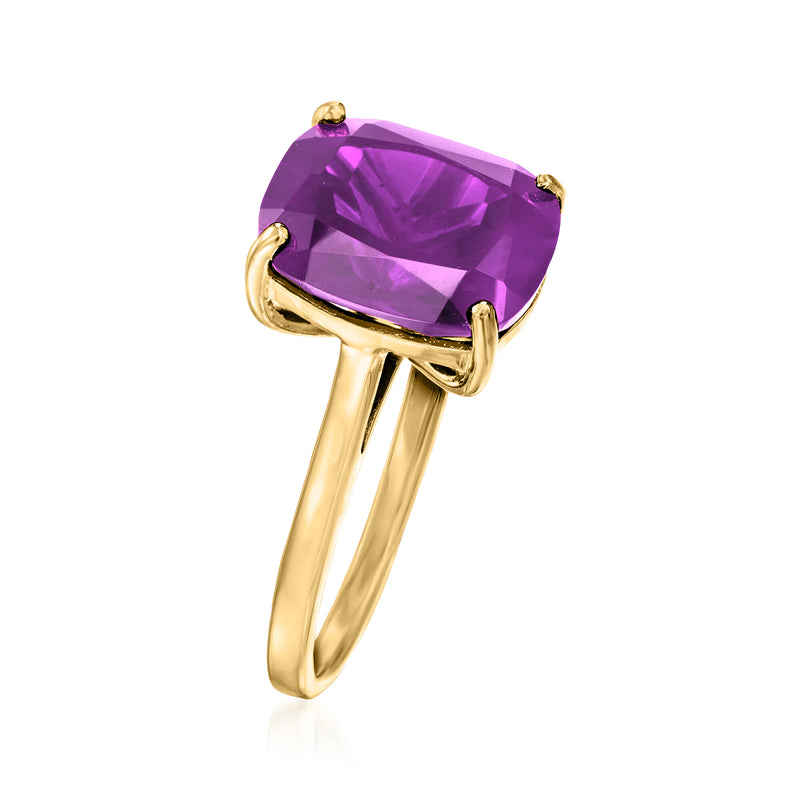 Gold-tone amethyst gemstone ring with oval purple stone and four prongs