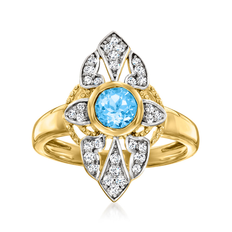 Swiss blue topaz ring with oval blue center and white stones; gold over silver