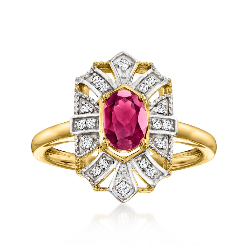 Sterling silver and 18kt gold ring with oval rhodolite garnet center and diamond halo