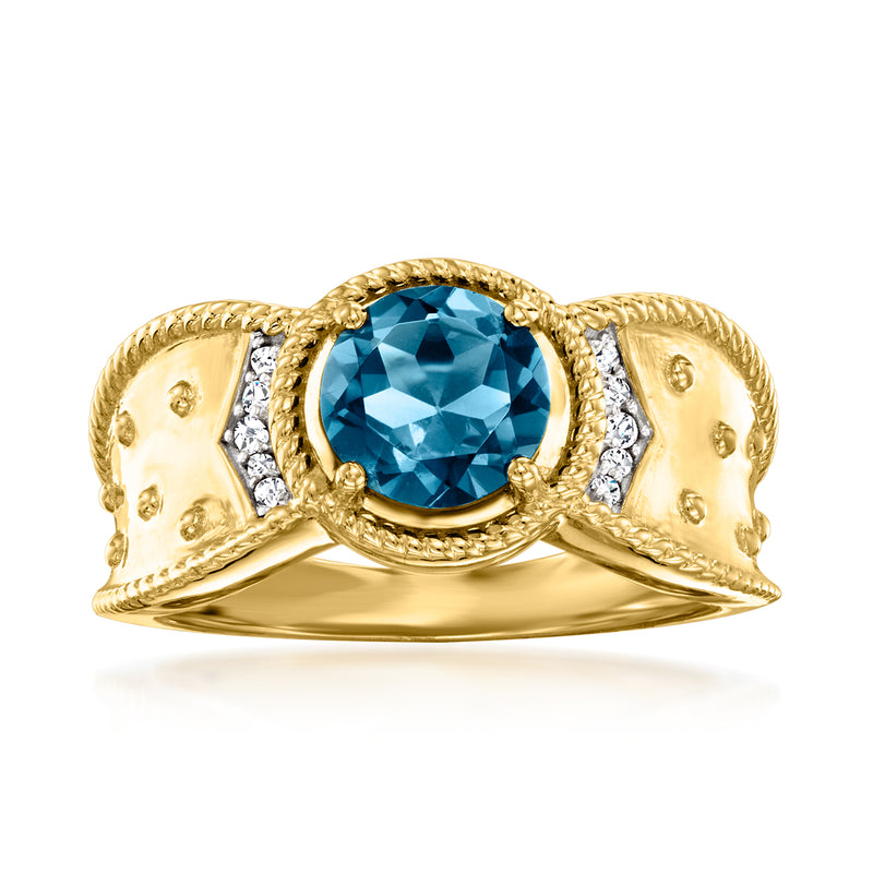 Gold ring with round blue topaz center, diamond side accents, scalloped halo.