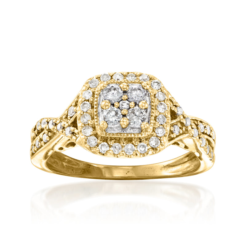 Vintage diamond ring in 14kt yellow gold with round diamond cluster and pavé band