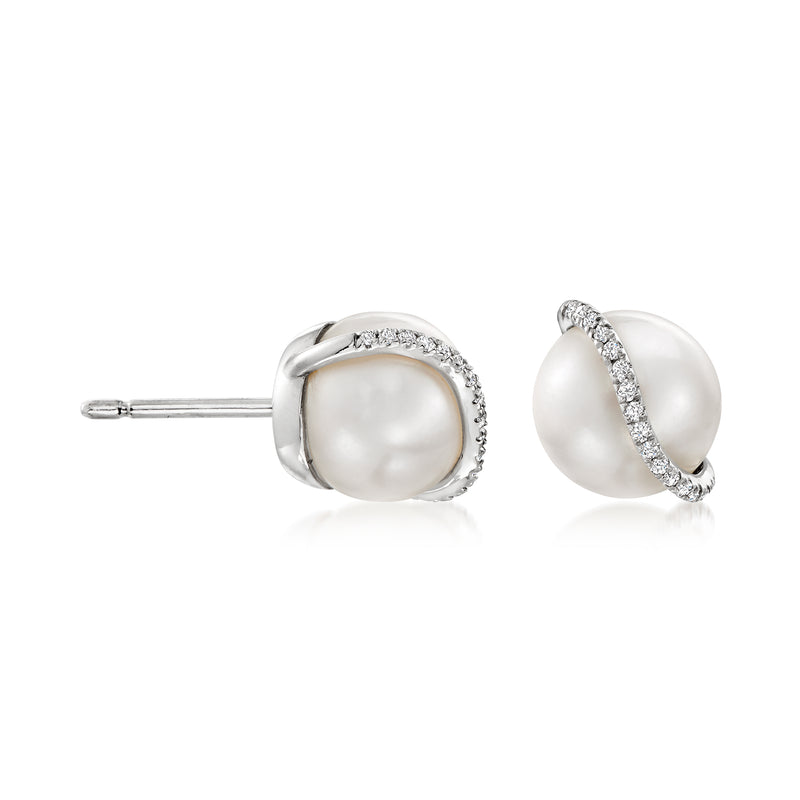 Sterling silver pearl post earrings with diamond pave swirl on the front