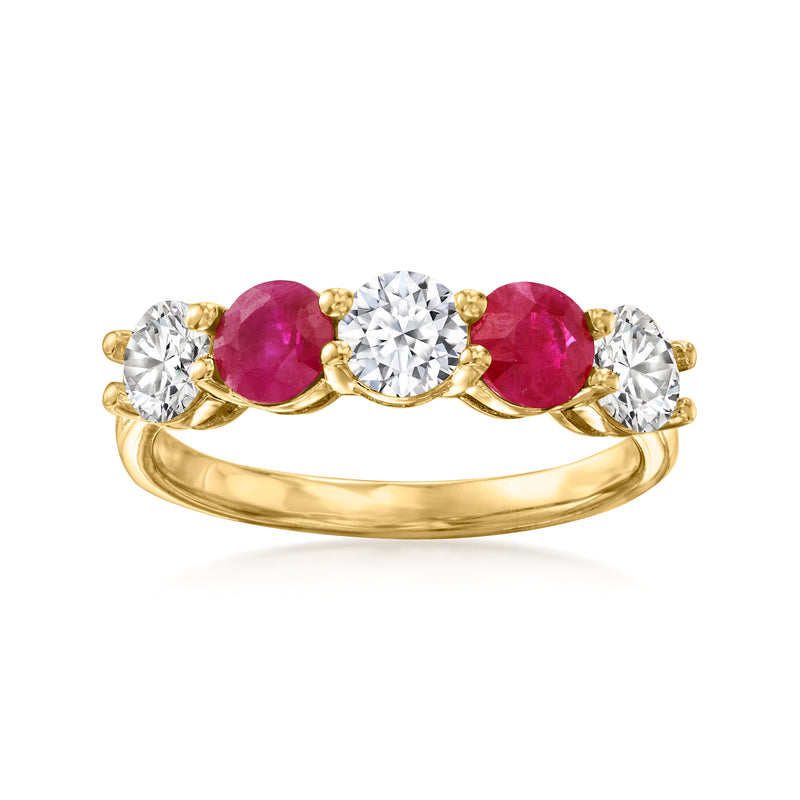 14kt yellow gold ring with center round diamond, ruby accents, and round side diamonds