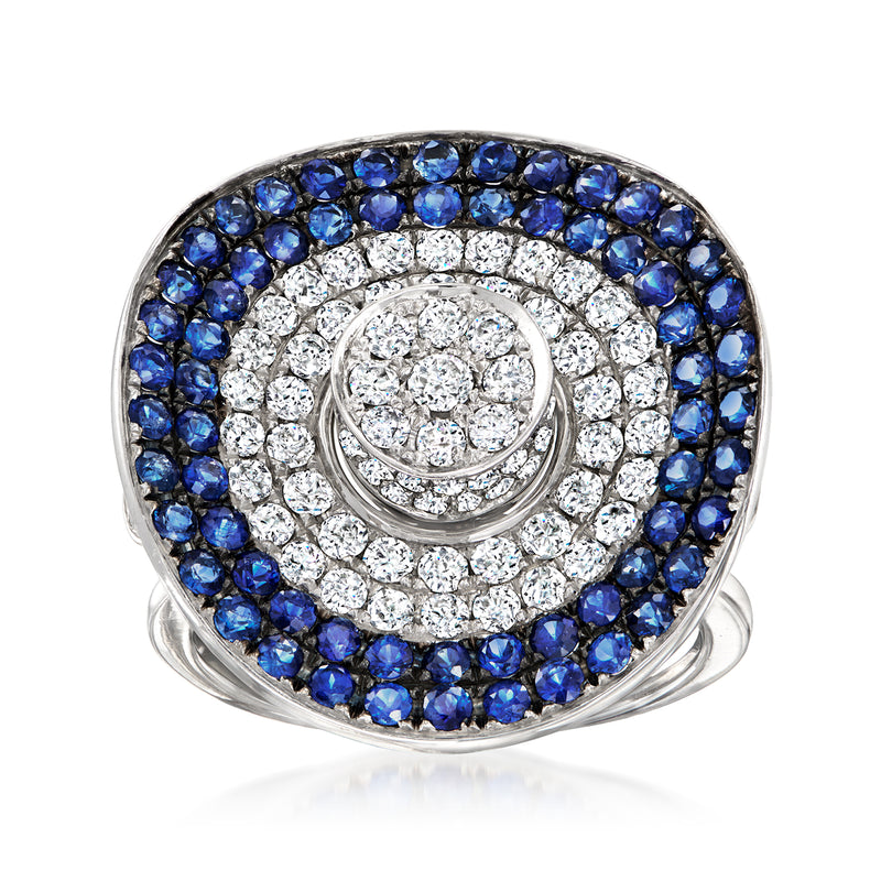 Vintage cocktail ring with blue sapphire oval halo and diamond center in white gold
