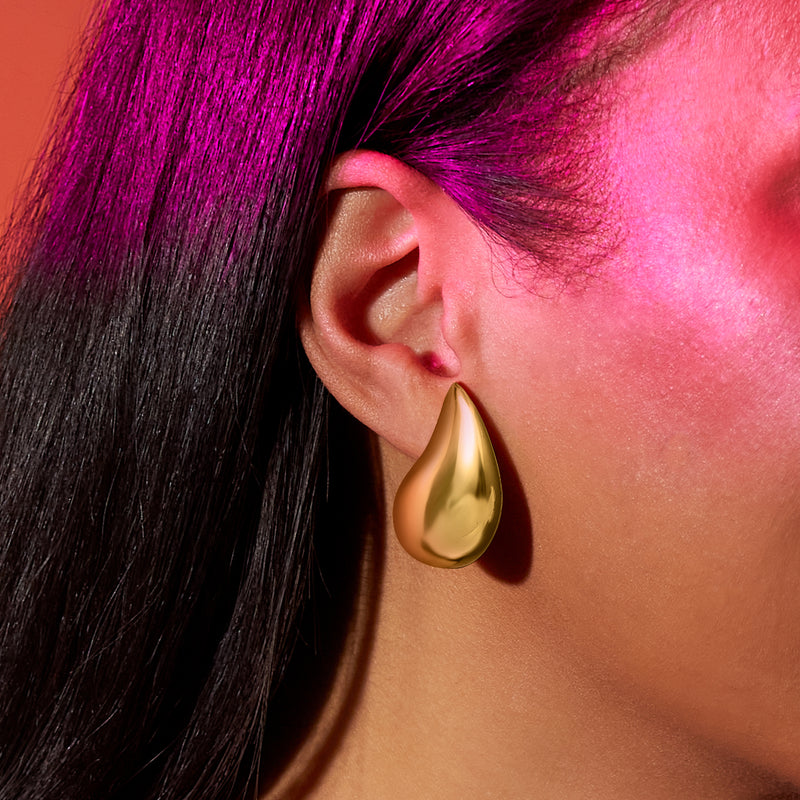 14kt yellow gold teardrop drop earring, glossy teardrop curve on a post
