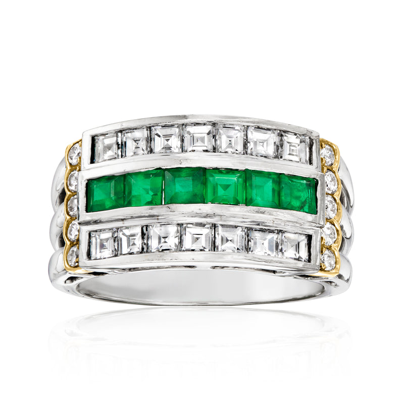 Vintage platinum ring with green emerald center, baguette diamonds, and 14kt yellow gold sides