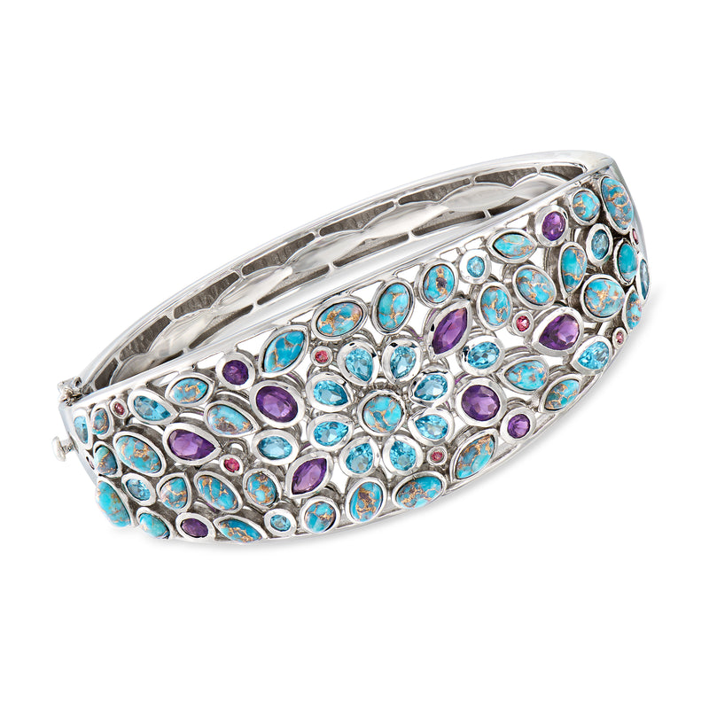 Sterling silver bangle bracelet with blue opal-style and purple gemstones, turquoise accents