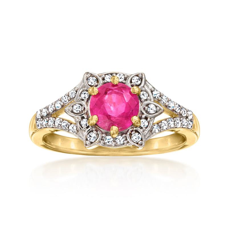 Pink sapphire and diamond halo ring in yellow gold over sterling, round pink center