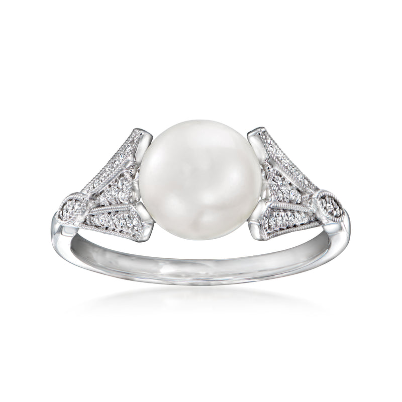 Sterling silver ring with large round white cultured pearl and diamond-accent shoulders