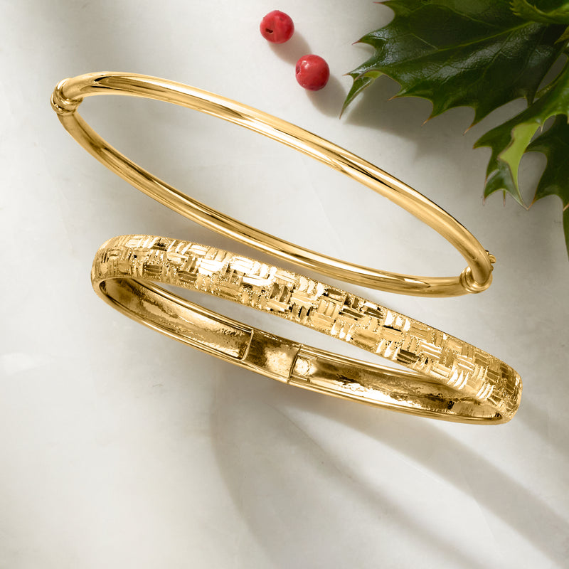 Polished 10kt yellow gold bangle bracelet with textured inner surface pattern