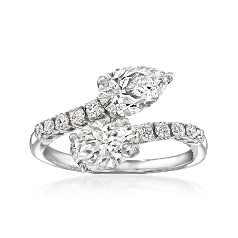 White gold toi et moi bypass diamond ring with two oval stones and pave band